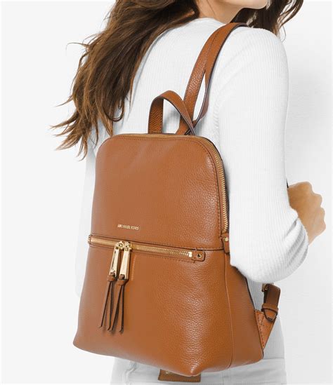 michael kors rhea zip slim backpack